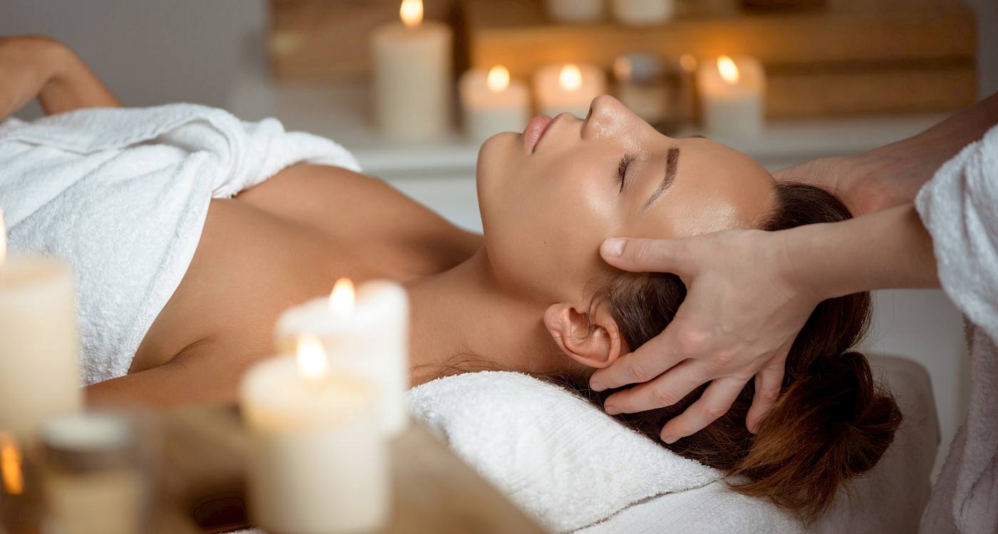 Woman getting head massage